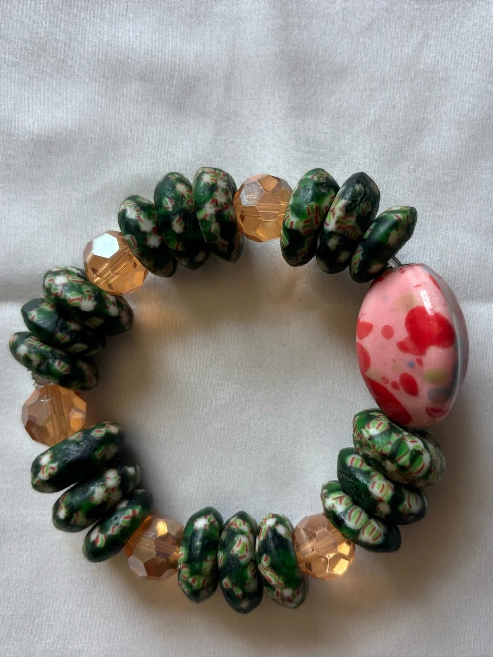 Green Millefiori Bead Stretch Bracelet with Pink Accent
